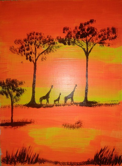 Жирафи на заході сонця