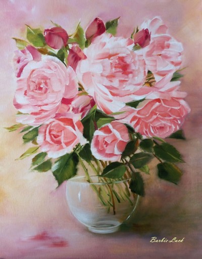 Bouquet of roses and peonies in a glass vase 