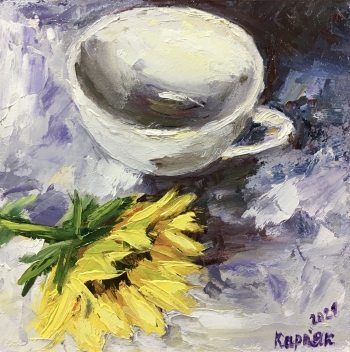 Cup and sunflower