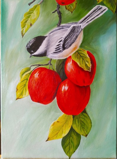 The bird on an apple tree