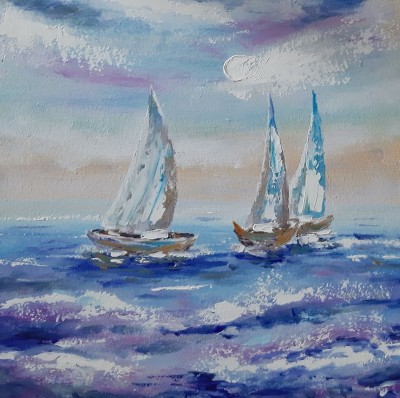 sailboats at sea